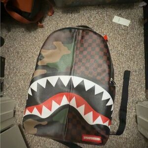 Sprayground Camouflage and Checkered Backpack